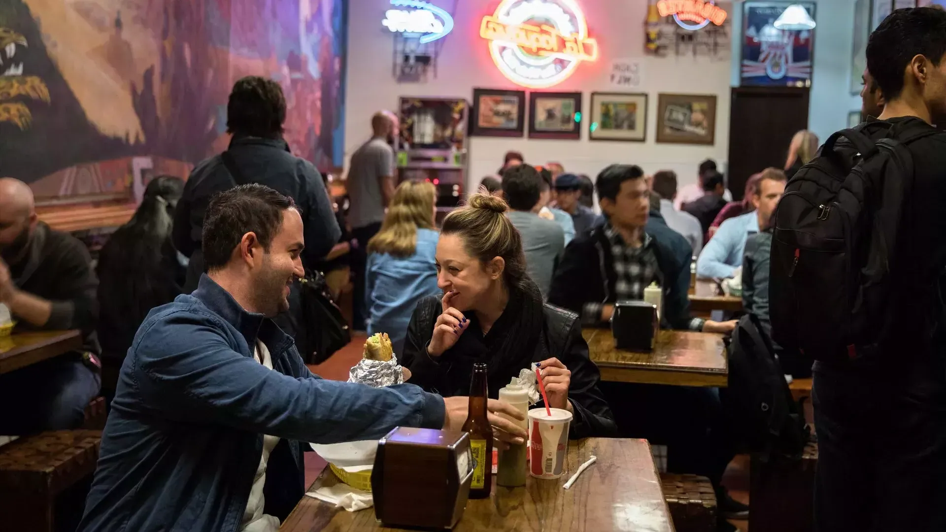 Visitors enjoy authentic Mexican food in San Francisco's Mission neighborhood.