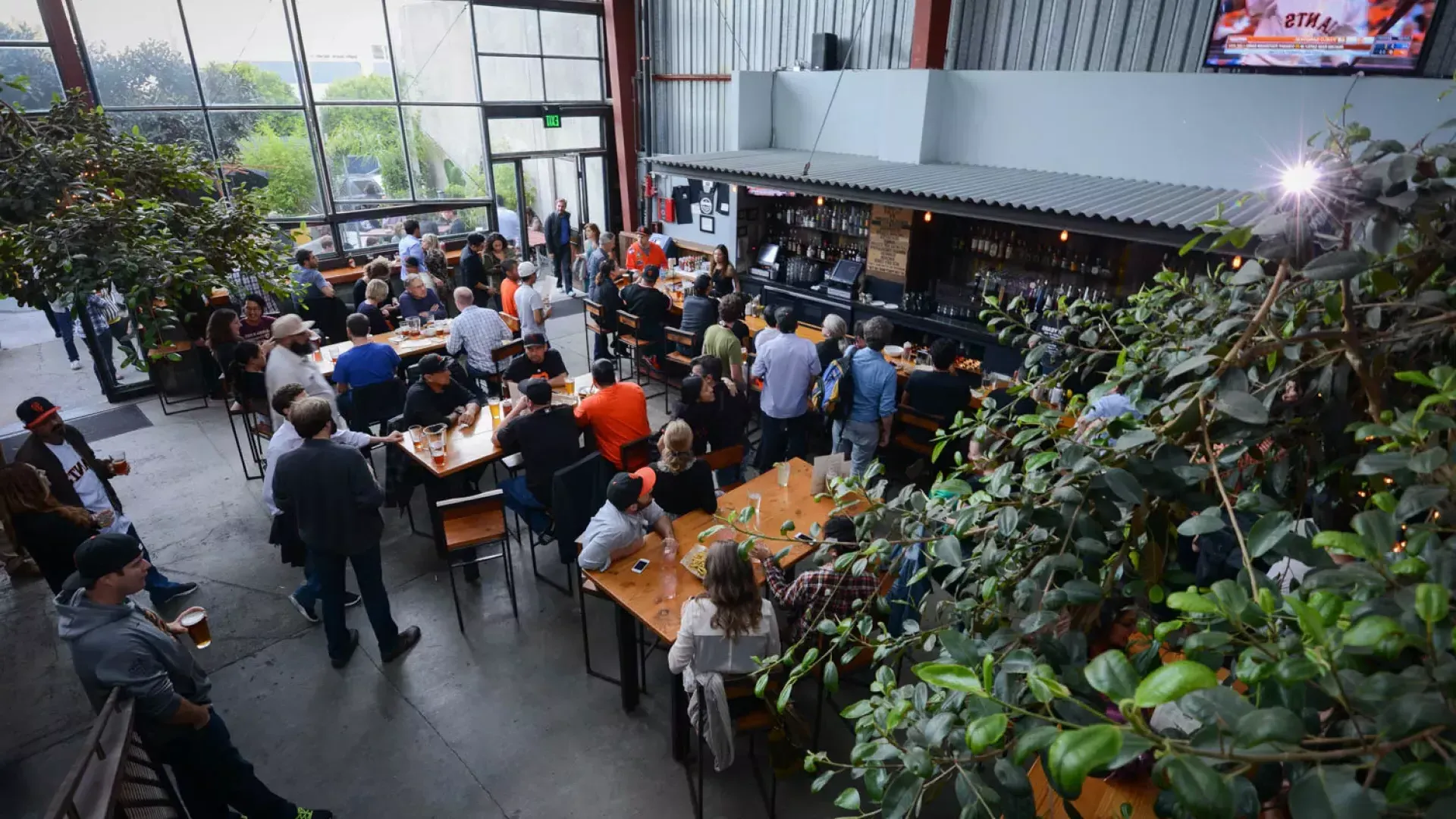 Patrons eat and drink at Southern Pacific Brewing in San Francisco.