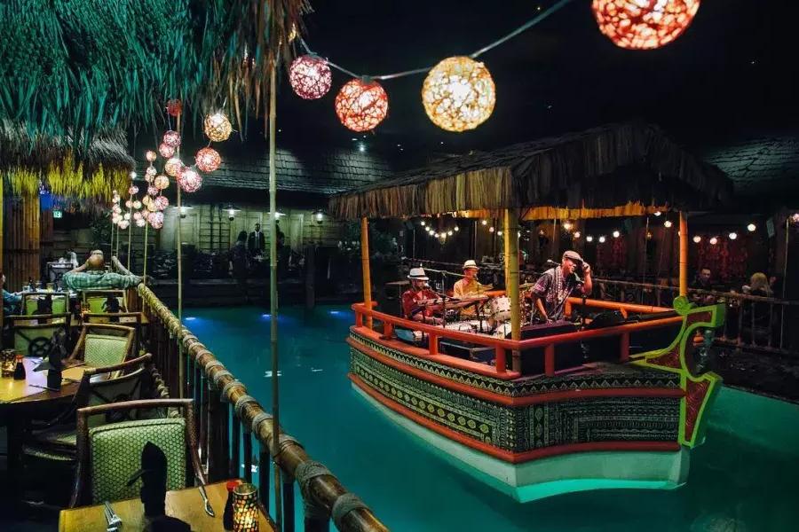 The house band plays in the lagoon of the world-famous Tonga Room at San Francisco's Fairmont Hotel.